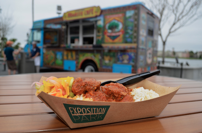 Park logo design on food container in front of food truck